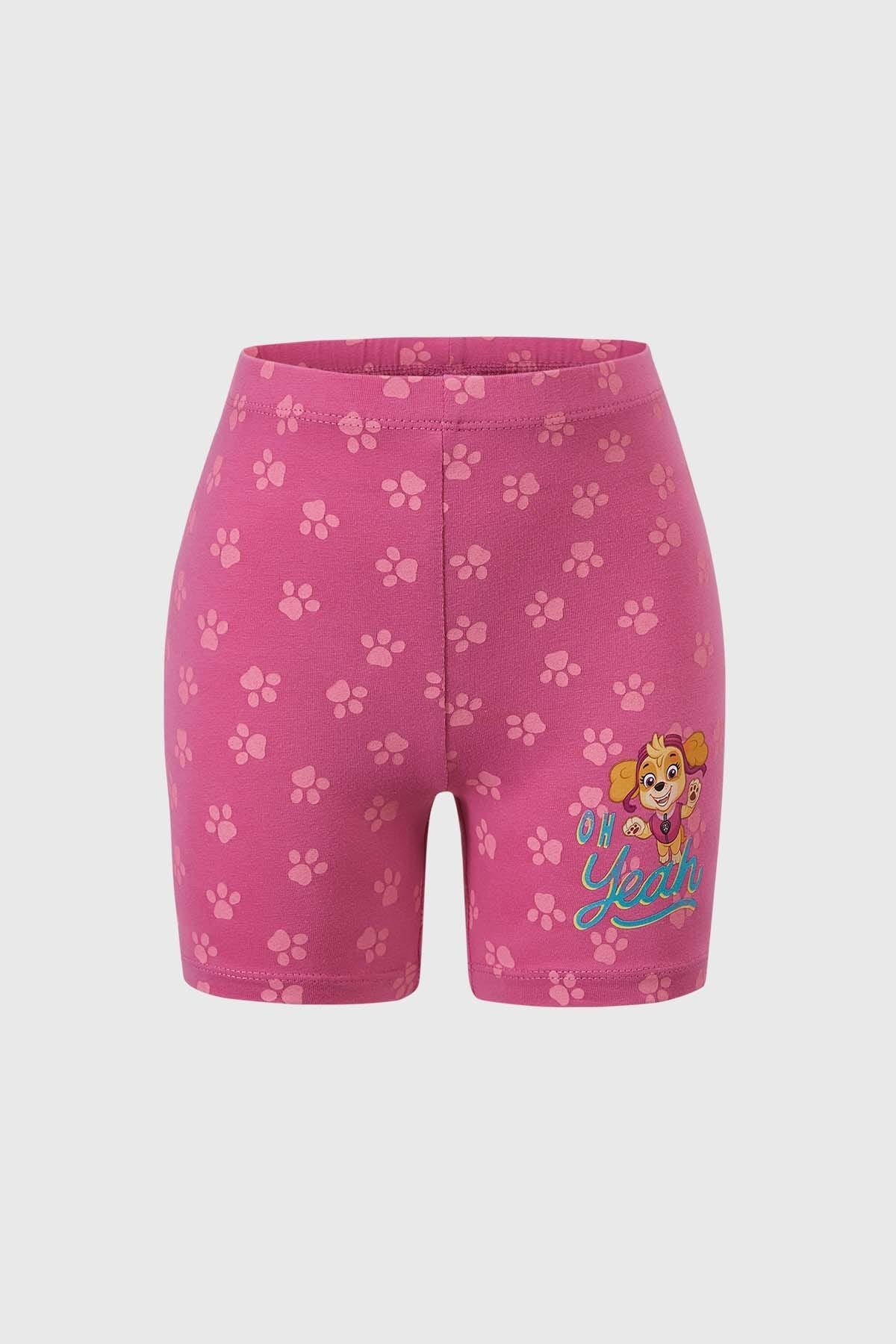Calza niña Paw Patrol fucsia con estampado de huellitas y gráfico divertido.