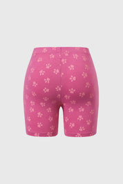 Calza niña Paw Patrol fucsia con estampado de huellitas y gráfico divertido.
