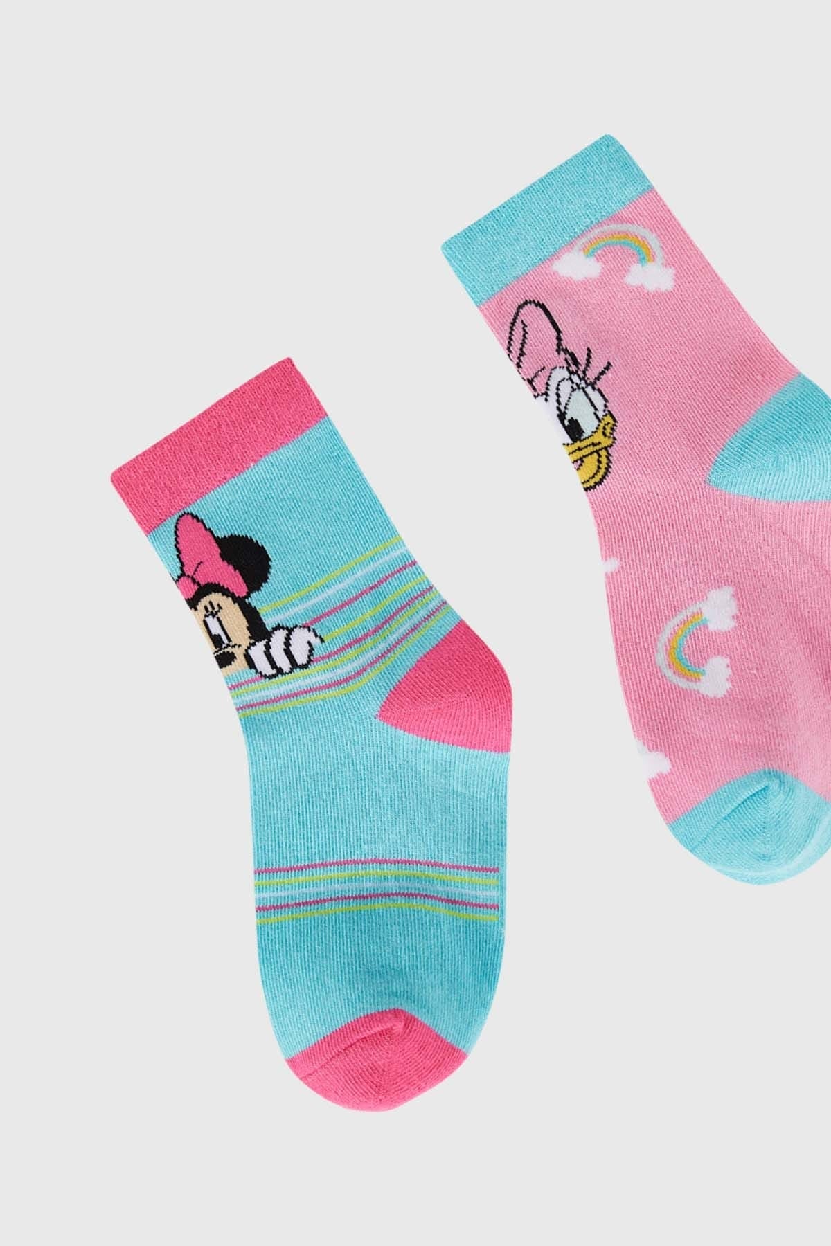 Calcetín niña bipack turquesa con estampados de personajes divertidos.