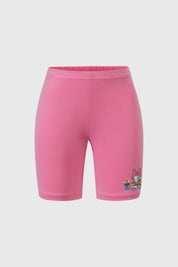 Calza rosada para niña con estampado de Mickey y sus amigos.