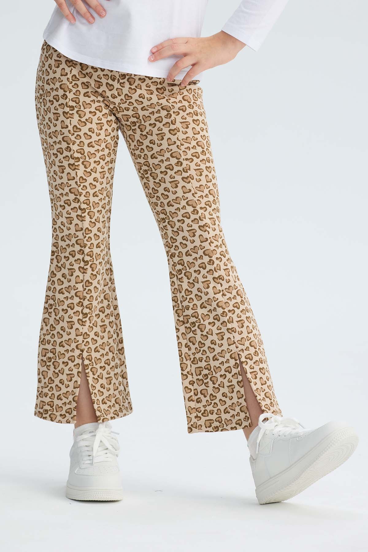 Calza niña full print beige con corazones