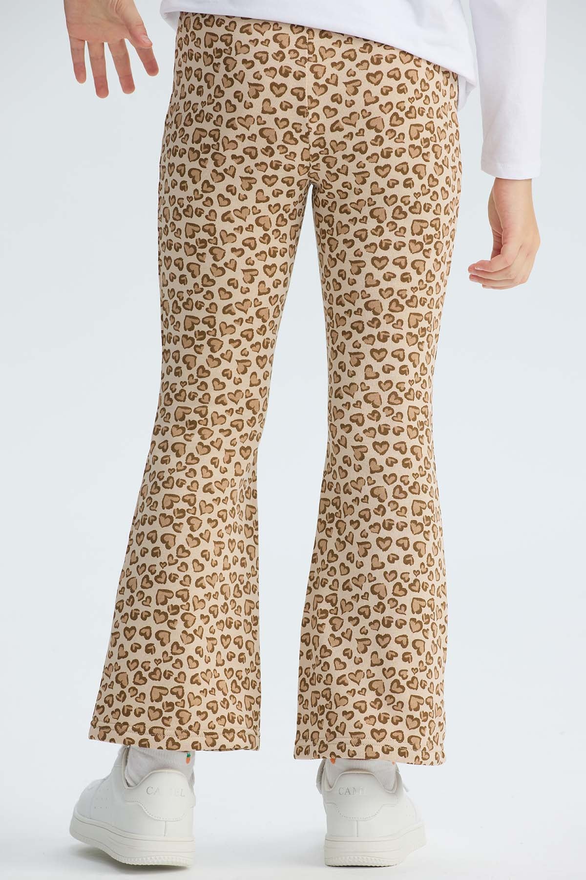 Calza niña full print beige con corazones