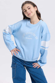 Polerón niña print posicional celeste