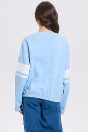 Polerón niña print posicional celeste