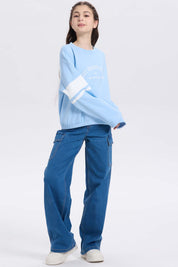 Polerón niña print posicional celeste