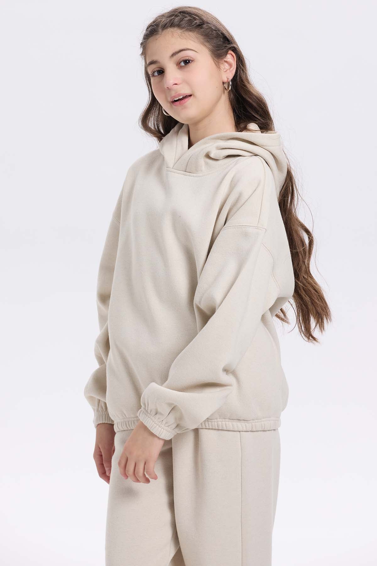 Polerón niña brillos beige