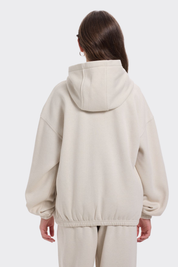 Polerón niña brillos beige