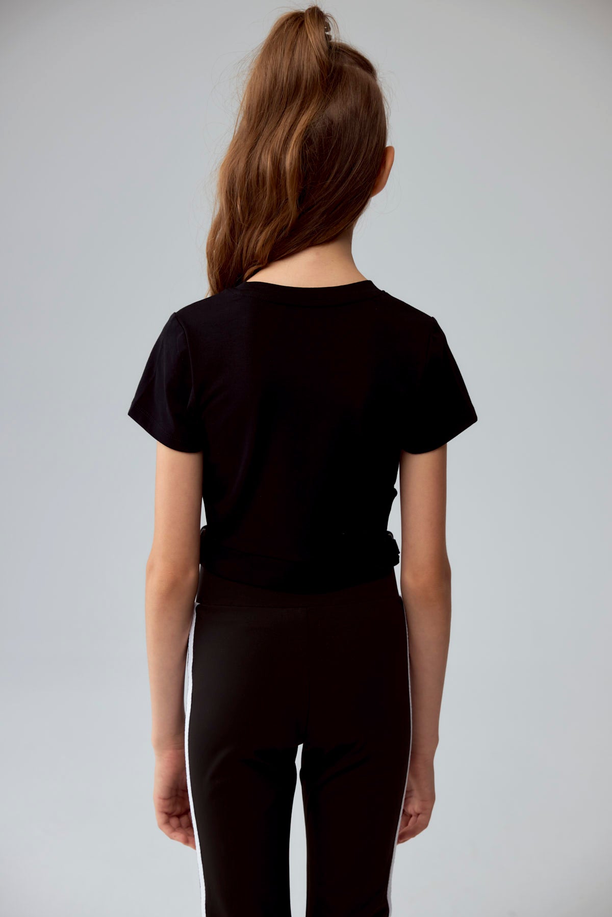 Polera Niña Argolla Costado Negro