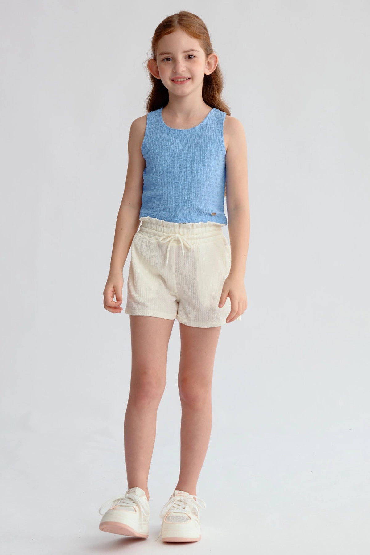 Polera Niña Textura Tipo Peto Celeste