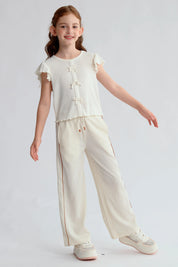 Pantalón Niña Crep Accesorios Cordón Beige