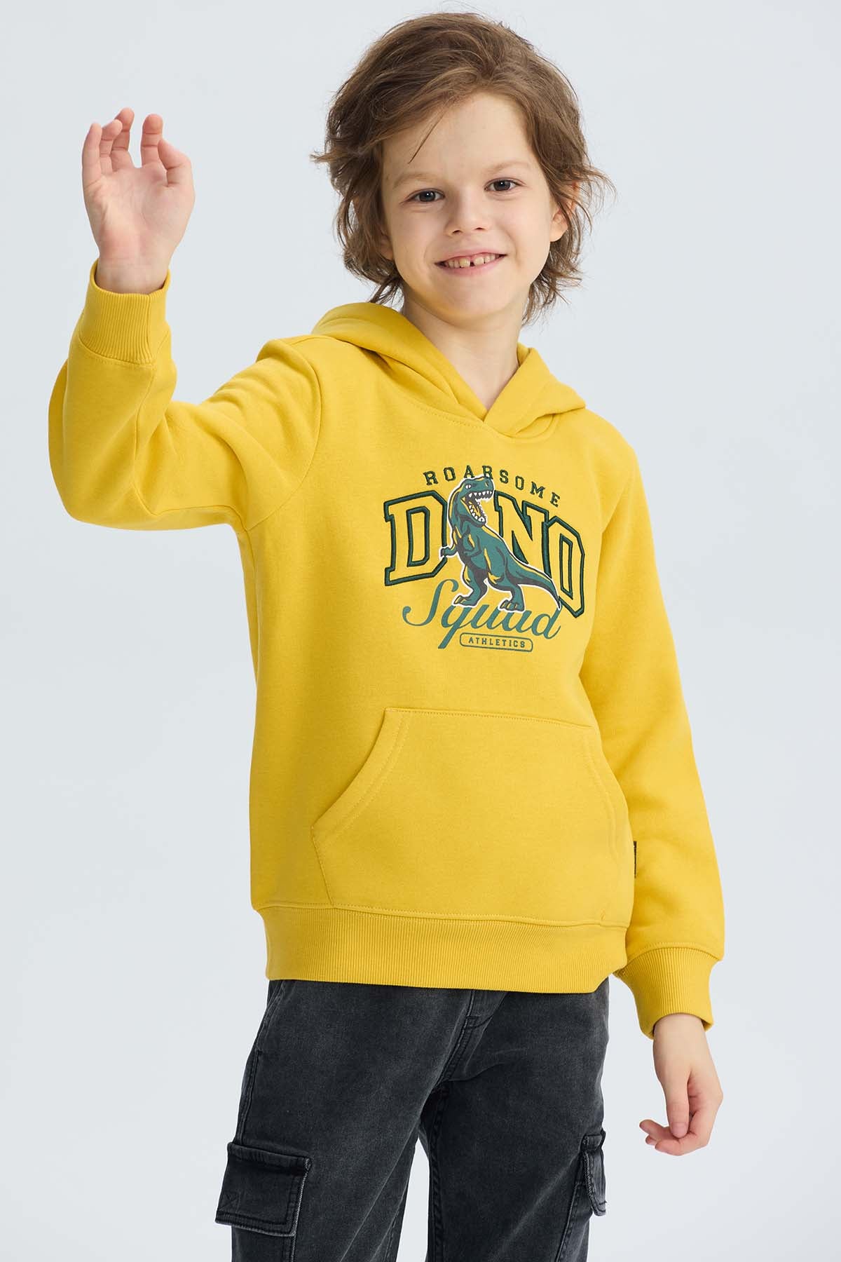 Polerón niño básico print amarillo con estampado dinosaurio