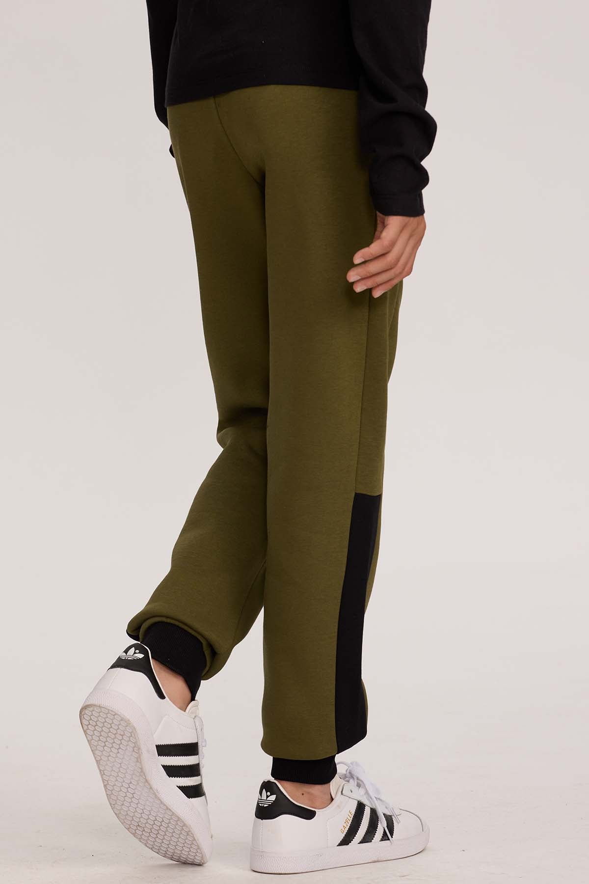 Pantalón Buzo Niño Con Cortes Verde