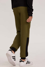 Pantalón Buzo Niño Con Cortes Verde