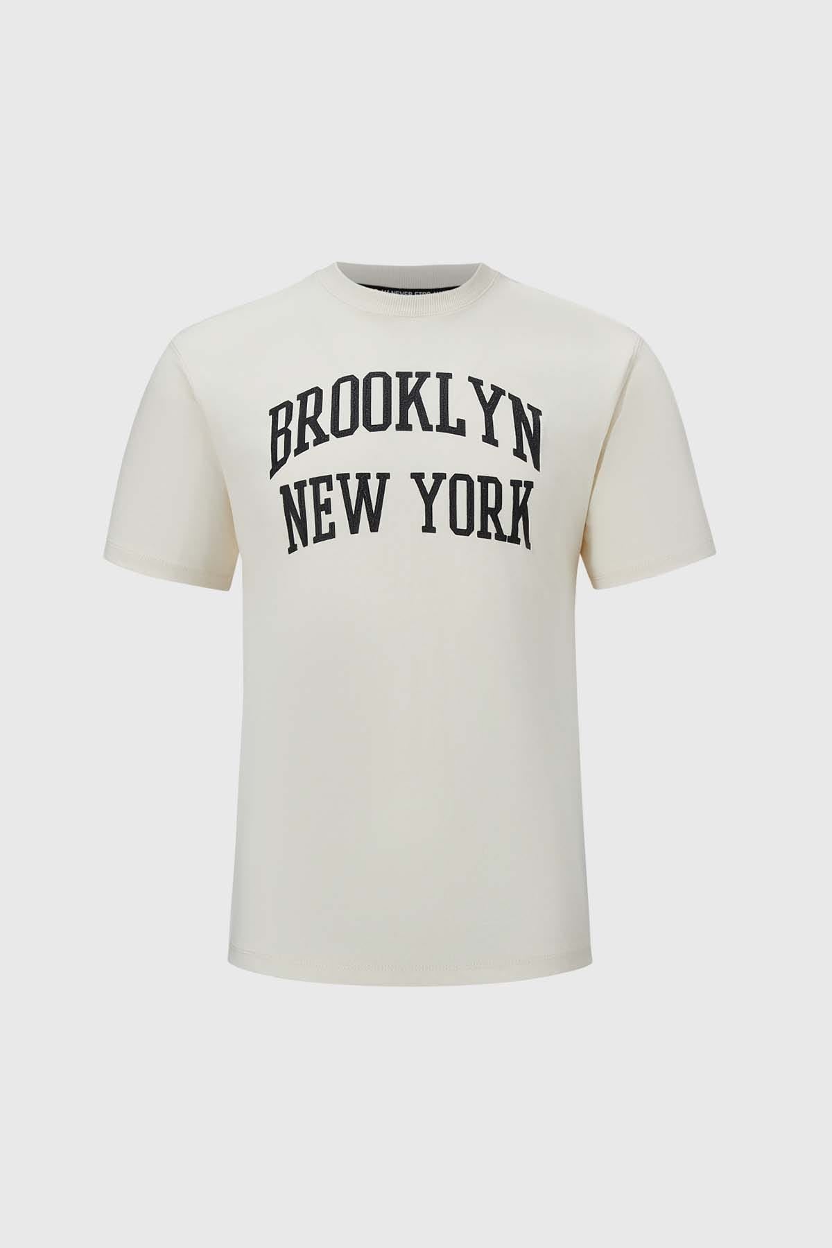POLERA NIÑO COLLEGE OVERSIZE BLANCO