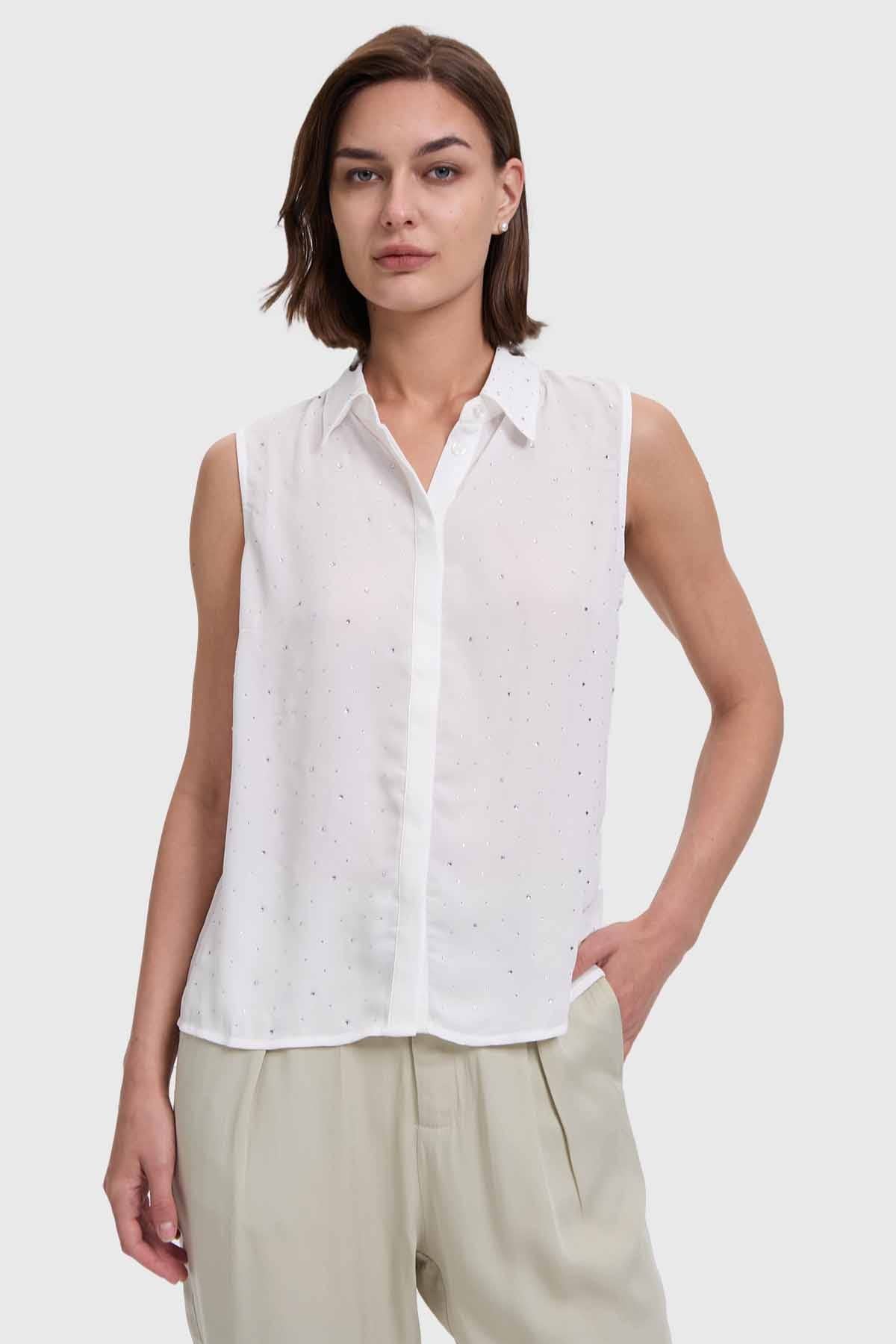 BLUSA MUJER ABOTONADA APLICACIÓN CRUDO