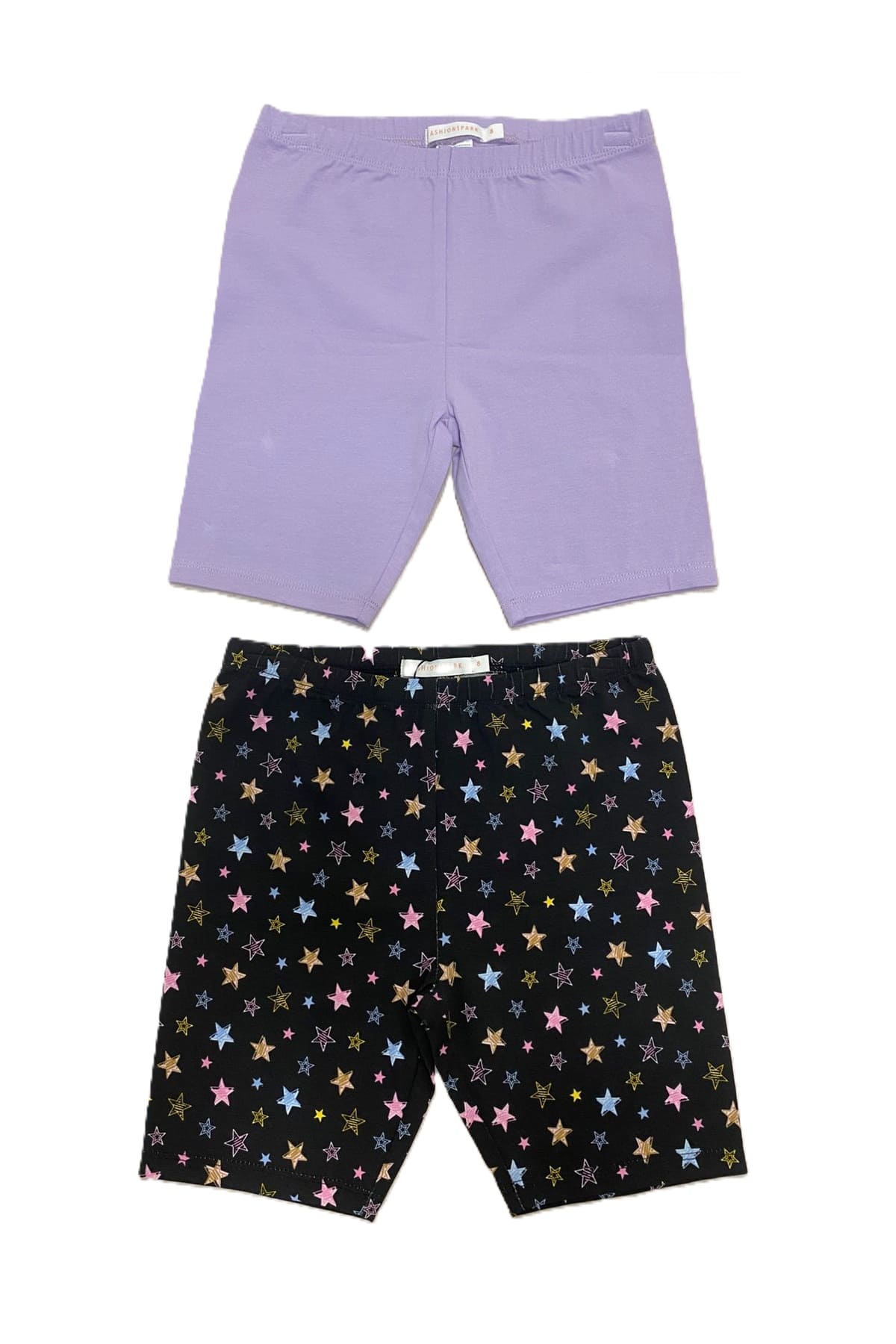 Calza negra para niña con estampa de estrellas coloridas en toda la superficie estilo divertido y moderno