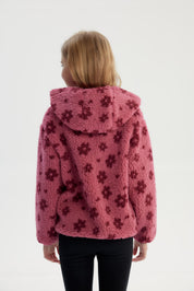 Polar niña slim rosado con capucha y diseño de flores oscuras en todo el tejido y bolsillo frontal con cierre pequeño