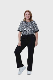 PANTALÓN BUZO MUJER CLÁSICO FLARE NEGRO