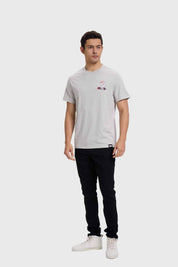 Polera gris para hombre con estampado de Looney Tunes, diseño casual y cómodo.