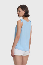 BLUSA MUJER APLICACIÓN NUDO PABILO CELESTE