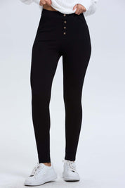 Calza negra de mujer con botones al centro y ajuste ceñido