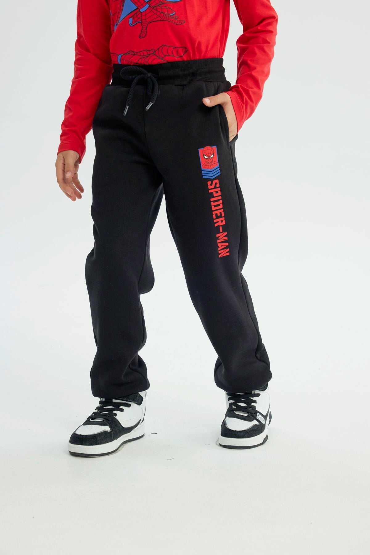 Pantalón Buzo Niño Pitillo Spiderman Negro