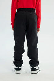 Pantalón Buzo Niño Pitillo Spiderman Negro