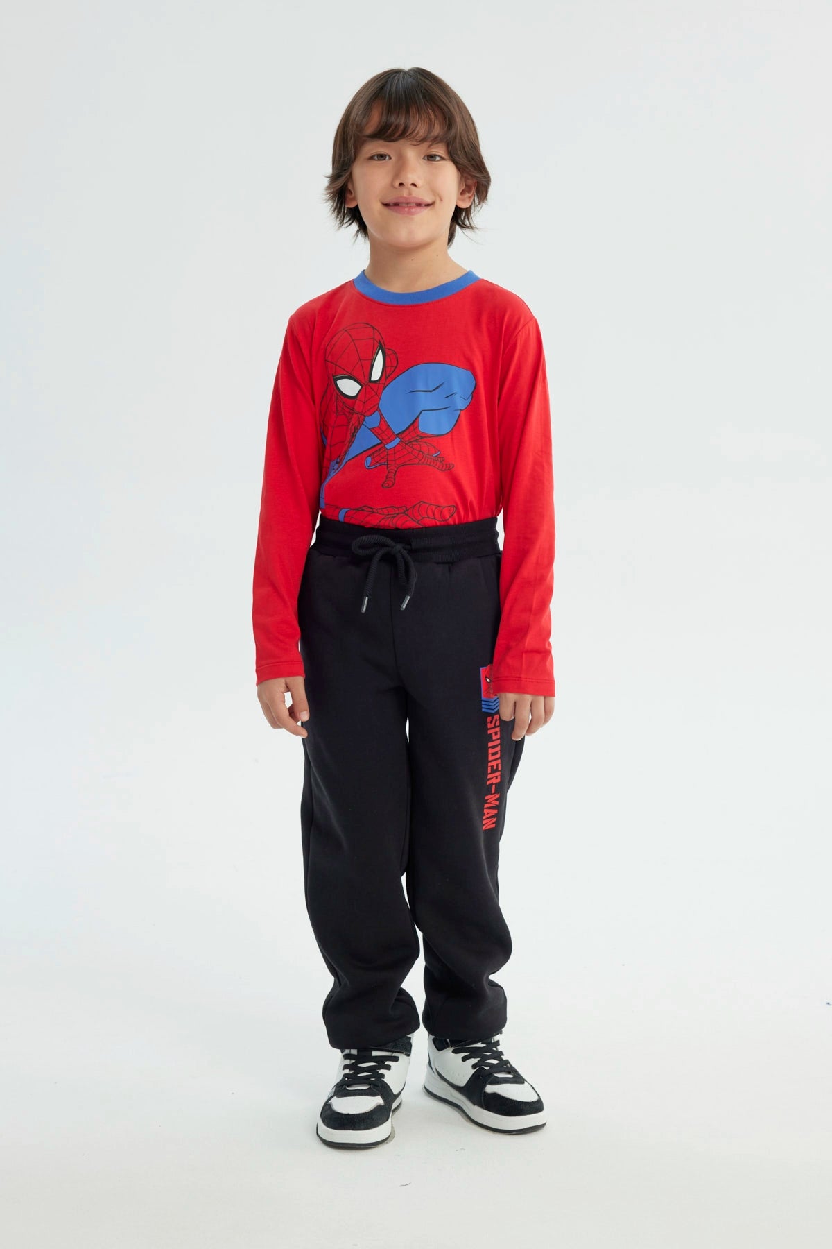 Pantalón Buzo Niño Pitillo Spiderman Negro