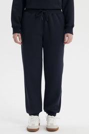 Pantalón jogger azul marino para mujer con cintura elástica y ajuste de cordón prenda lisa ideal para días relajados