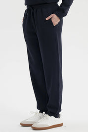 Pantalón jogger azul marino para mujer con cintura elástica y ajuste de cordón prenda lisa ideal para días relajados