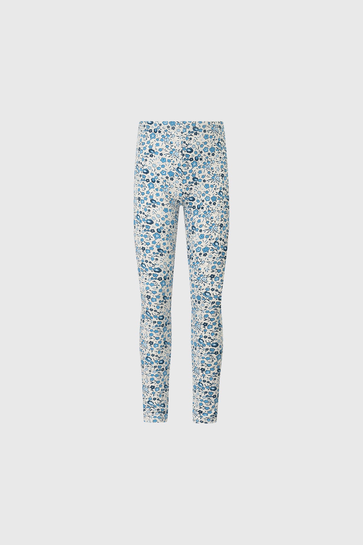 Bipack de calzas para niña en azul marino y diseño floral azul blanco calza lisa y estampada a la izquierda de tamaño completo