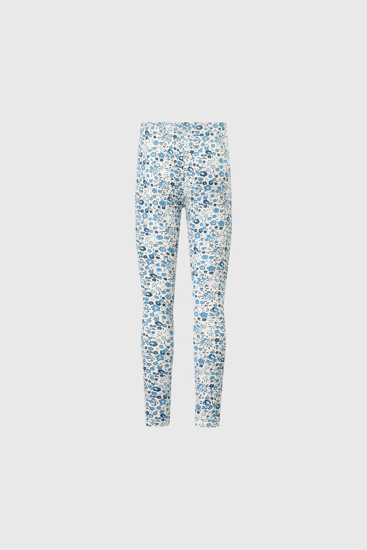 Bipack de calzas para niña en azul marino y diseño floral azul blanco calza lisa y estampada a la izquierda de tamaño completo