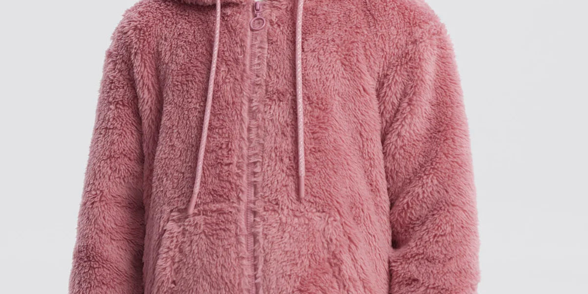 Polar niña peludo rosado con capucha y cierre delantero lisa cálida y cómoda ideal para días fríos