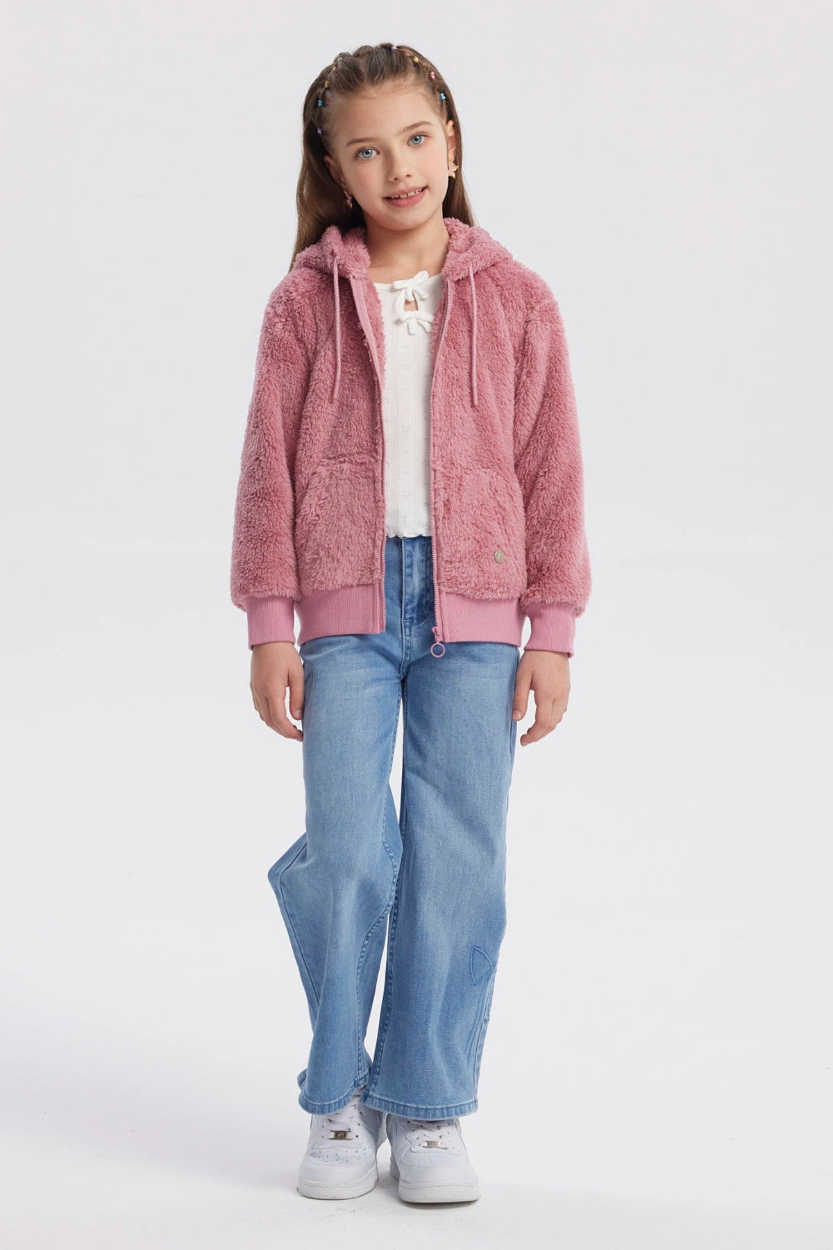 Polar rosado peludo para niña con capucha cierre al frente y bolsillos frontales diseño liso ideal para invierno
