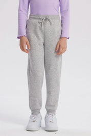 Pantalón jogger gris melange para niña con cintura ajustable y puños elásticos diseño liso ideal para comodidad diaria