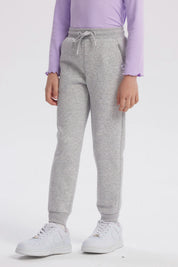 Pantalón jogger gris melange para niña con cintura ajustable y puños elásticos diseño liso ideal para comodidad diaria