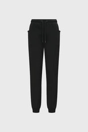 Pantalón buzo beige y negro para niña con bolsillos laterales diseño liso estilo casual ideal para días relajados