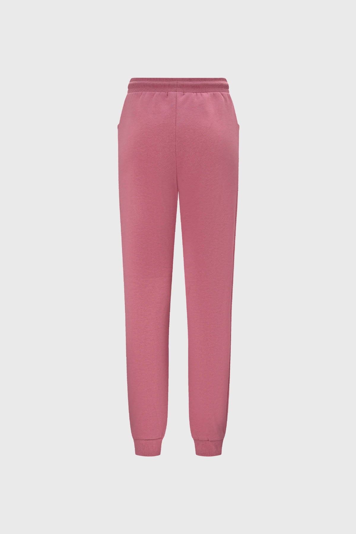 Pantalones buzo niña bipack rosado con ajuste de cordón y bolsillos amplios uno rosado otro gris diseño liso casual