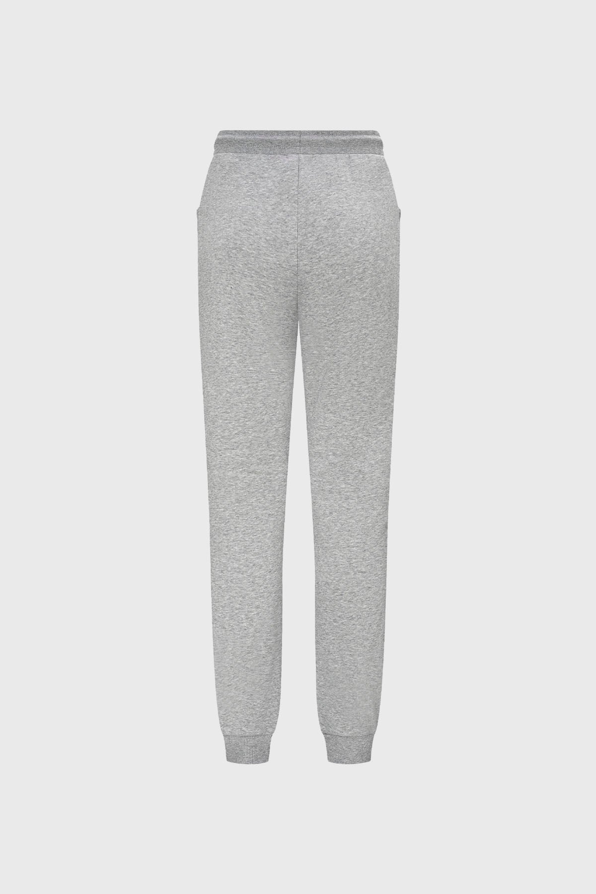 Pantalones buzo niña bipack rosado con ajuste de cordón y bolsillos amplios uno rosado otro gris diseño liso casual