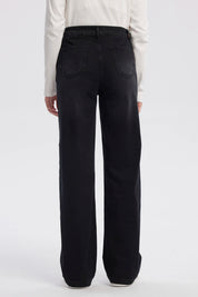 Jeans wide leg negro para niña con diseño liso y corte moderno sin estampa visibles adecuados para ocasiones casuales