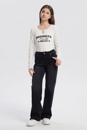 Jeans wide leg negro para niña con diseño liso y corte moderno sin estampa visibles adecuados para ocasiones casuales