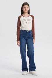 Jeans niña wide leg azul con diseño liso corte amplio sin estampa visible