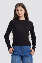 Polera negra para niña de cuello alto parcial manga larga diseño liso ajuste cómodo ideal para días frescos