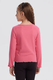 Polera niña slim fucsia con manga larga y estampa frontal de texto 'Best Friend' con flor pequeña estilo casual