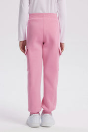 Pantalón buzo pitillo rosado para niña con cintura elástica prenda lisa sin estampa ideal para actividades cotidianas