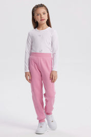 Pantalón buzo pitillo rosado para niña con cintura elástica prenda lisa sin estampa ideal para actividades cotidianas