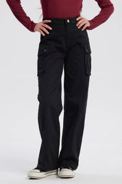 Pantalón niña wide leg negro con bolsillos cargo laterales estilo casual sin estampa lisa ideal para combinar con todo