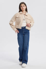 Chaqueta beige de niña estilo slim con cuello camisero y botones metálicos frontales prenda lisa ideal para el frío