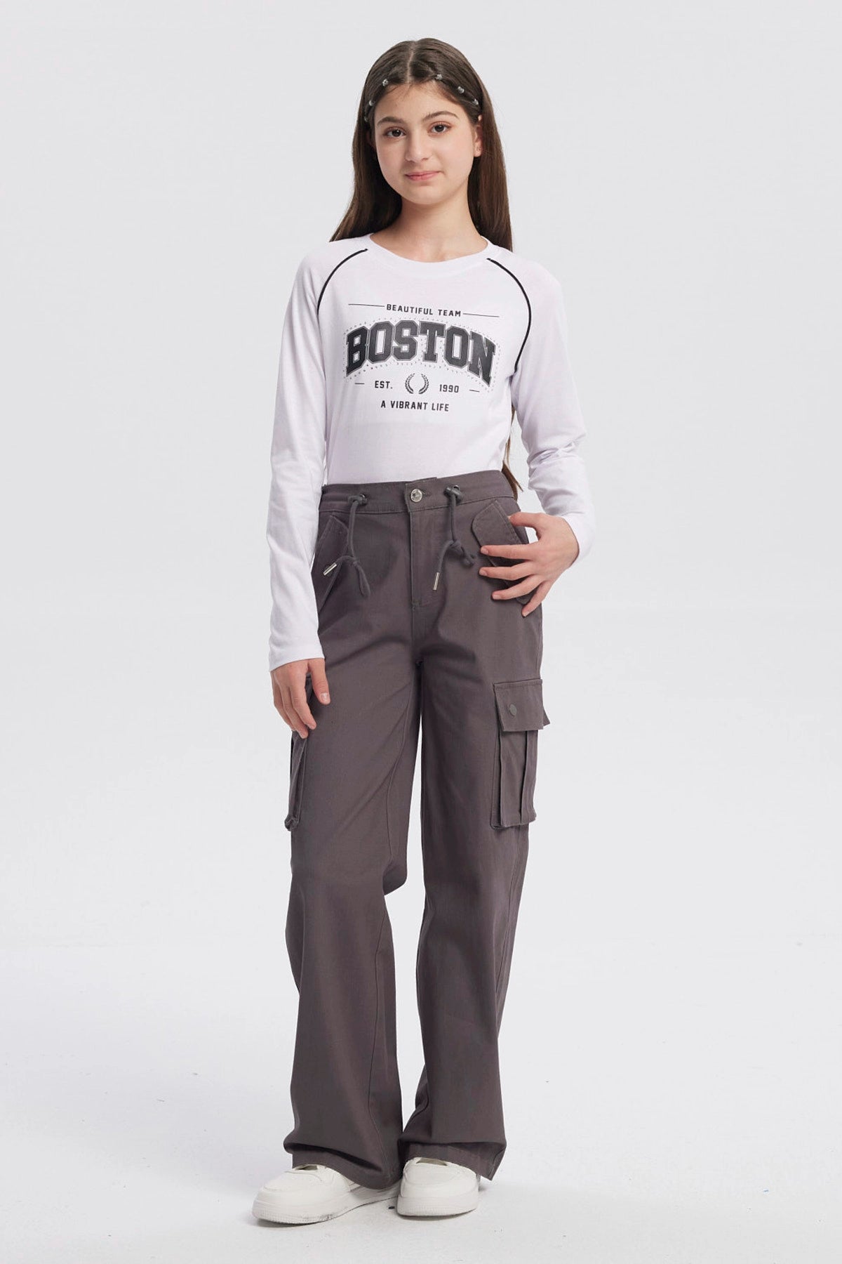 Pantalón cargo marengo niña con cordón ajustable bolsillos laterales amplios y diseño liso casual y versátil