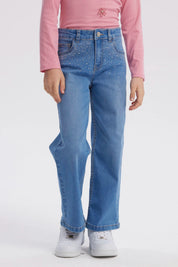 Jeans niña calce recto azul con pequeños brillos en los bolsillos delanteros prenda lisa y casual ideal para el día a día
